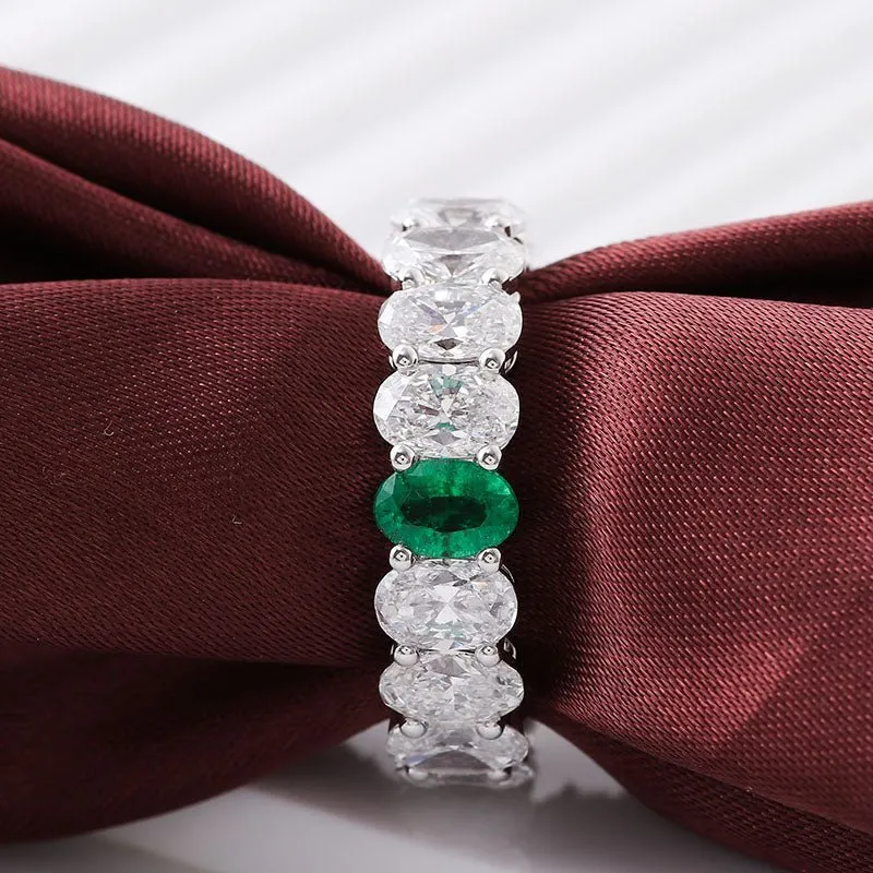 Exquisite Emerald Eternity Band